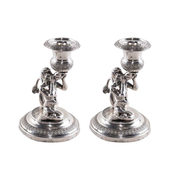Pair of small silver candlesticks