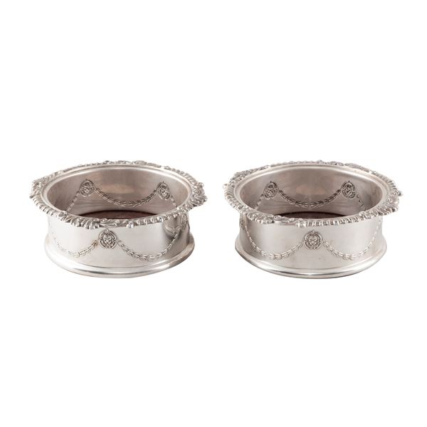 Pair of silvered metal and wood bottle coasters