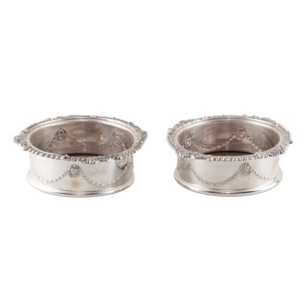 Pair of silvered metal and wood bottle coasters
