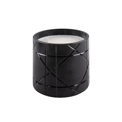 Dior, candela profumata in vaso di vetro colorato