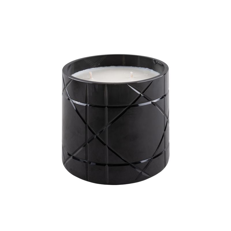 Dior, candela profumata in vaso di vetro colorato
