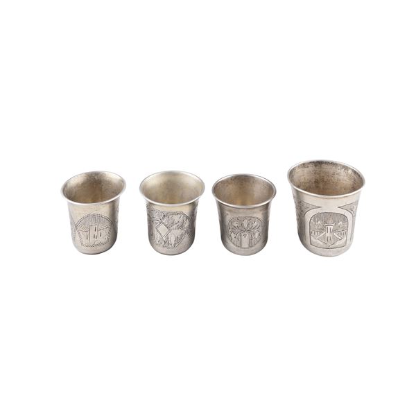 Four small silver and niello beakers