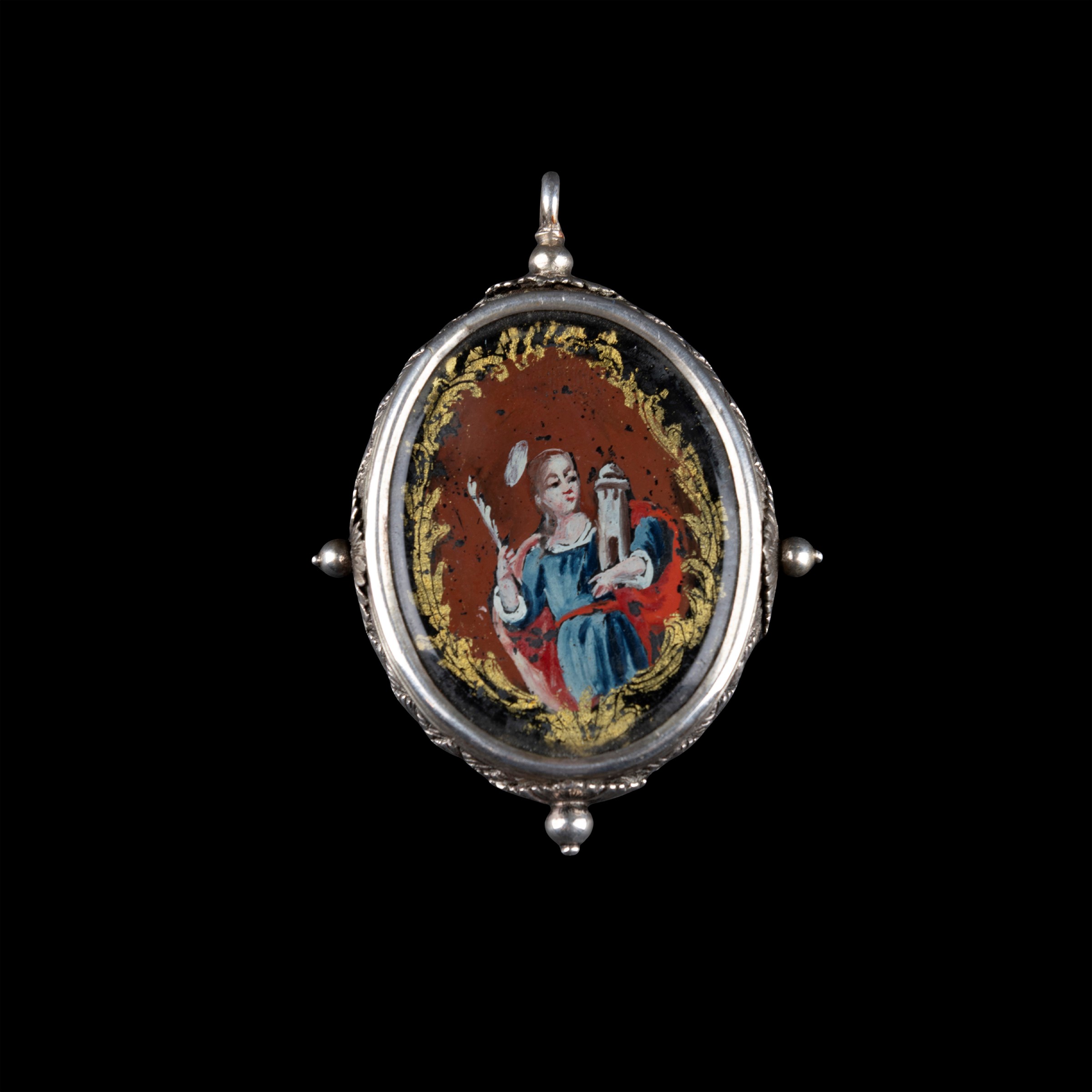 Pendenda devozionale, montatura in argento con miniature su vetro: Santa Barbara e un Santo Marti...
