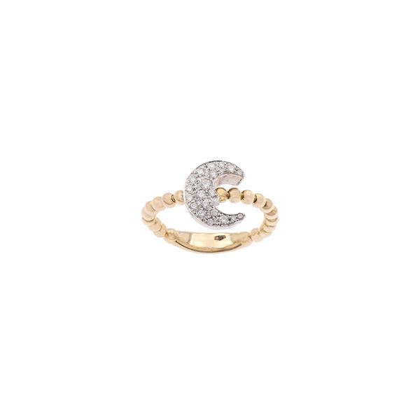 Anello mezzaluna in oro giallo e bianco 18kt con diamanti