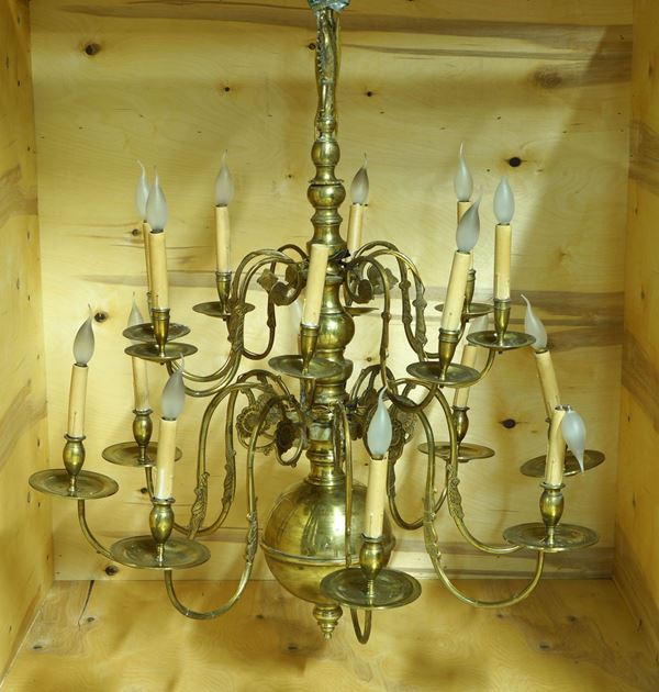 A sixteen-branch brass candelabra