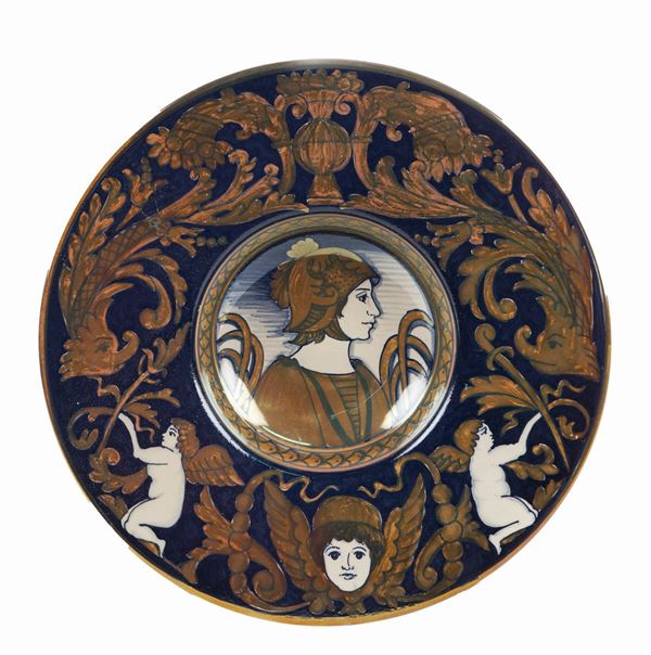 Piatto in ceramica smaltata  (Deruta, XX Sec.)  - Asta ASTA A TEMPO  - Colasanti Casa d'Aste