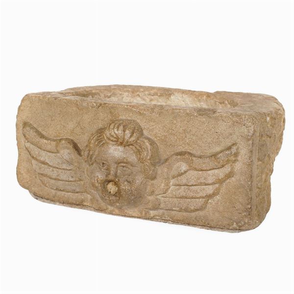 An antique Roman marble fountain basin